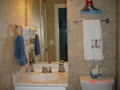 Each bedroom has its own bathroom with shower